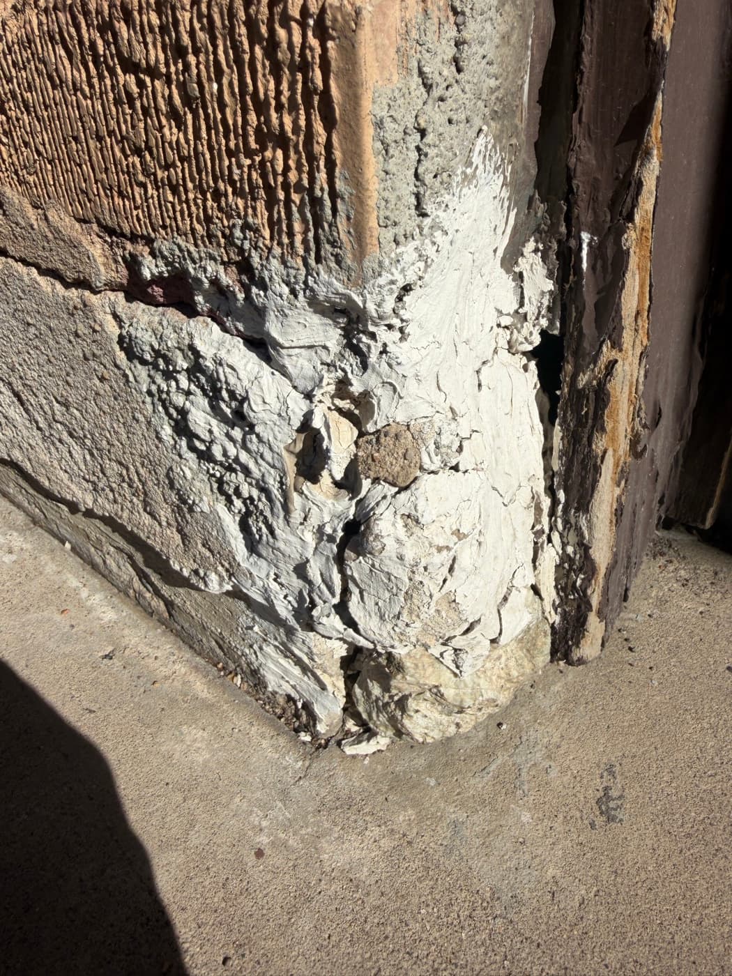 Failing plaster — bubbling and falling away