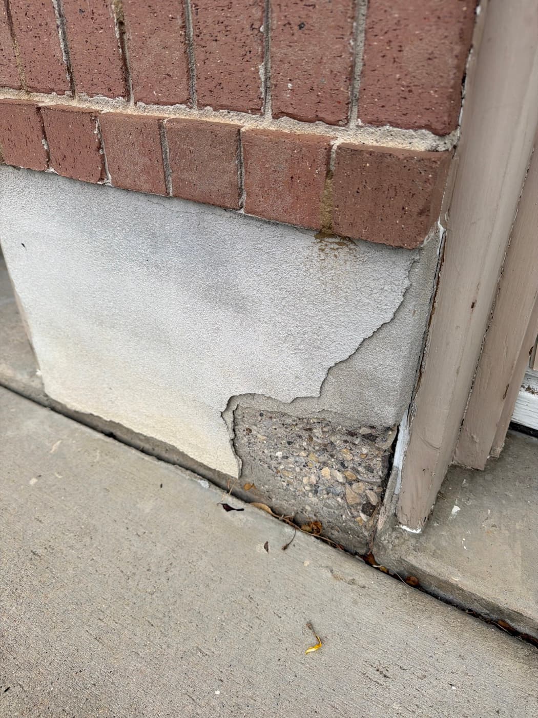 Water staining below a foundation crack